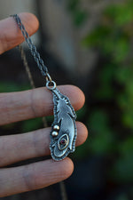 All Seeing Eye Feather Pendant - Garnet - 20" Chain